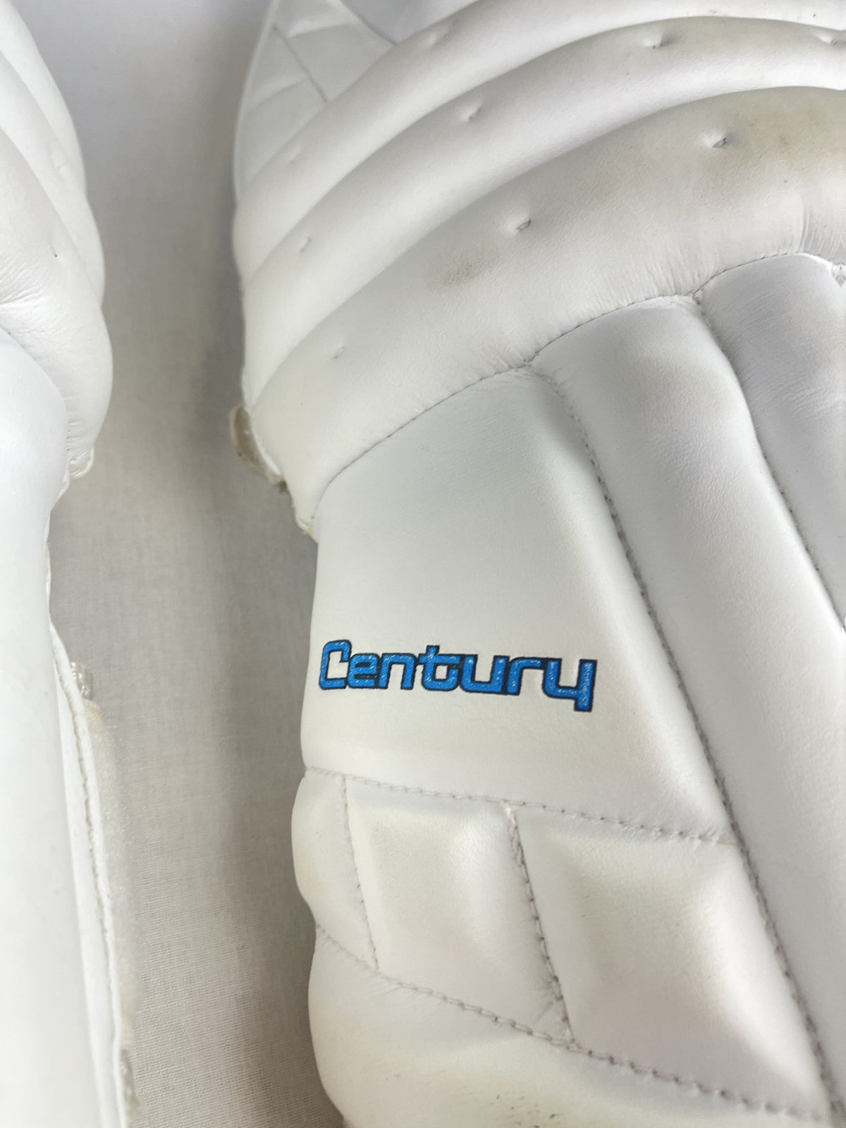 Century branding on the pad