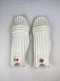 New Balance white senior cricket pads, front